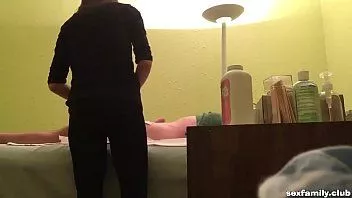 Play Wax salon girl strokes hard cock of customer on hidden cam